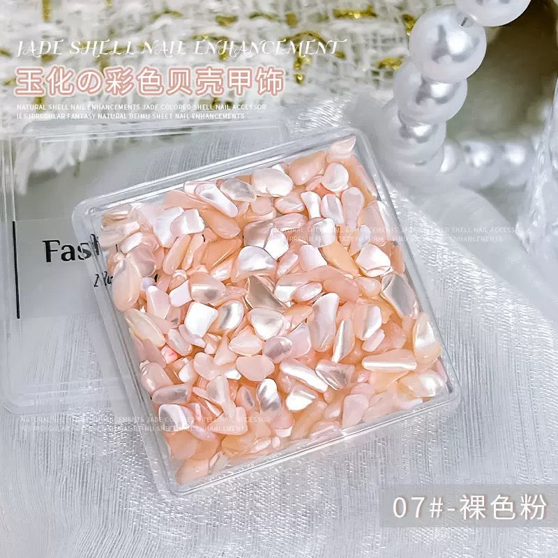 A box of jade-finished shell nail charm